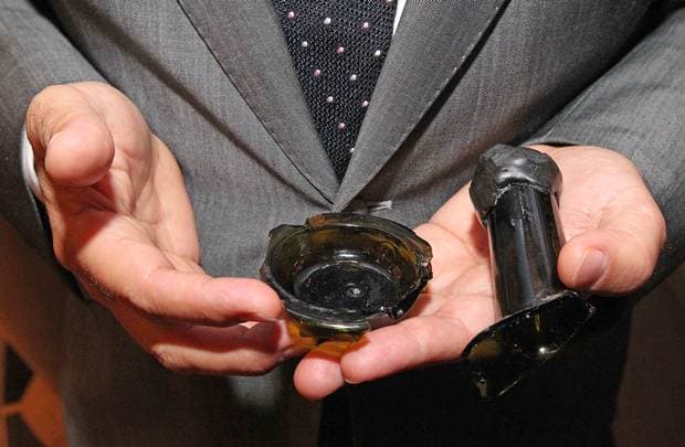 smashed bottle of Cognac