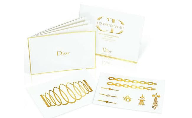 Dior golden temporary tattoos