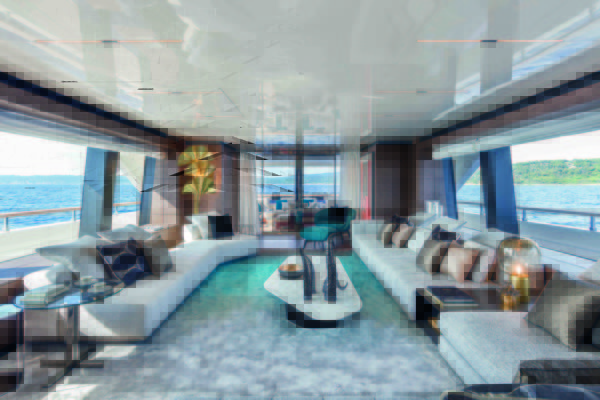 On the main deck, the enormous saloon features huge windows and seating that stretches along both sides