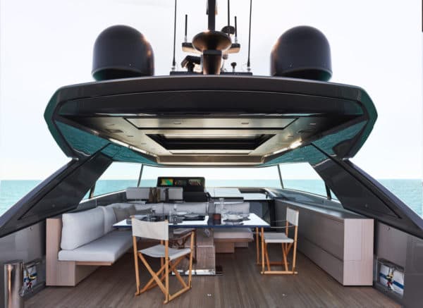 Flybridge furniture includes fold-up sofas on either side