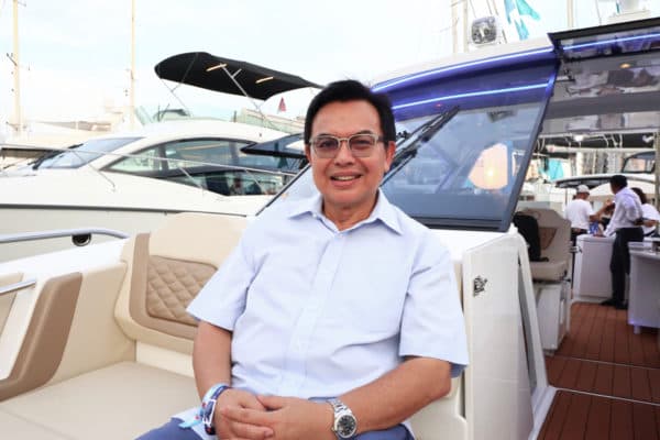 Tan Sri Dr Mohd Nadzmi Bin Mohd Salleh on his new Aquila 36 at the Singapore Yacht Show