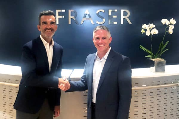 Raphael Sauleau, CEO of Fraser, with W. Brett McGill, CEO and President of MarineMax
