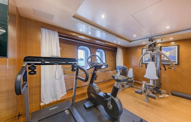 On the lower deck, the gym is midships and has a fold-down balcony