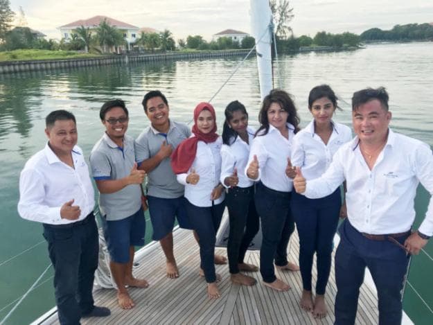 Theseira (far left), with his colleagues, is one of Malaysia’s most experienced yacht dealers and a familiar face throughout boating circles in Southeast Asia