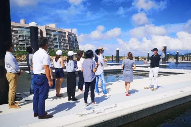 Rudy Puystjens, Marina Director, hosts a site visit for industry players