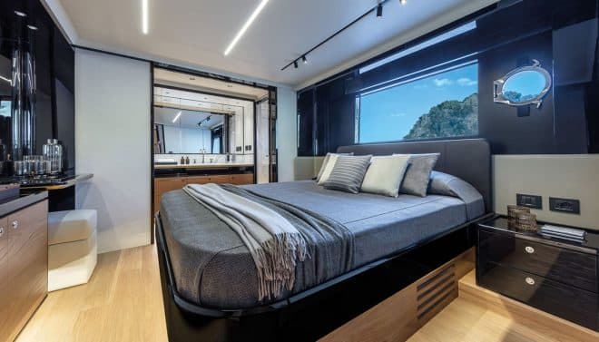 The VIP suite to port benefits from a large midships window and has a walk-in closet forward and an elegant bathroom aft