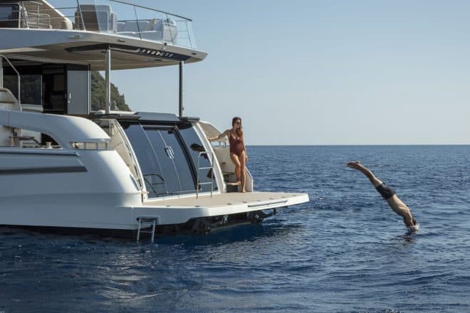 The interior beach club cabin is protected by watertight double sliding doors in smoked glass