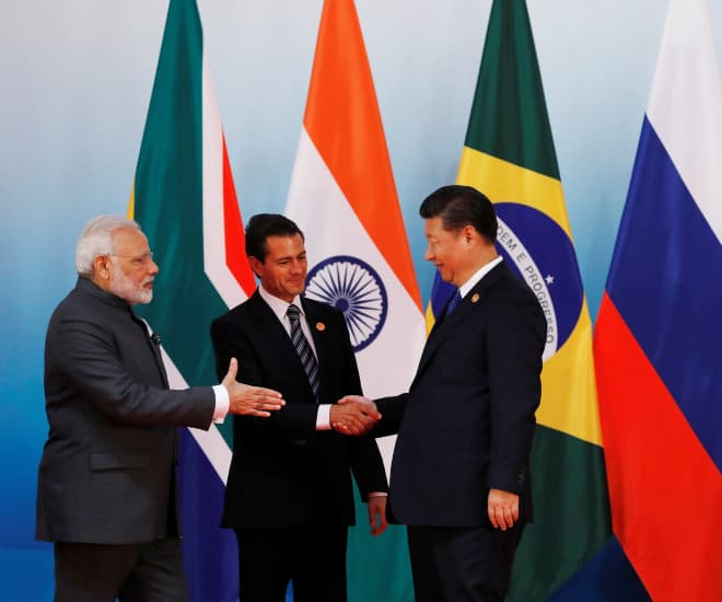 leaders of BRICS exchanging warm greetings